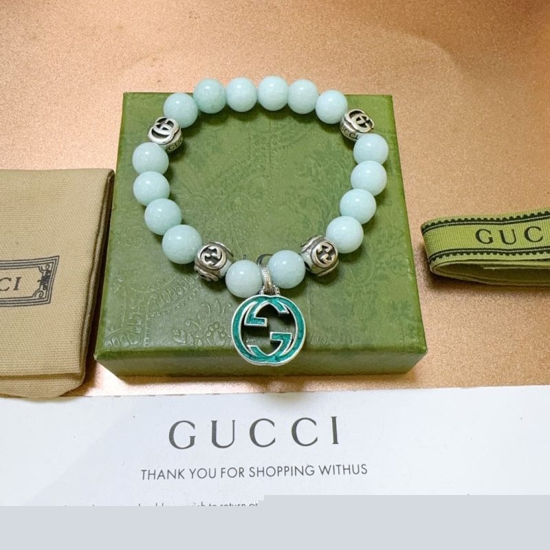 G*u*i bracelets